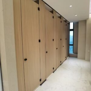 HPL toilet cubicles for corporate offices with floor-to-ceiling style and modern design in a high-traffic environment.